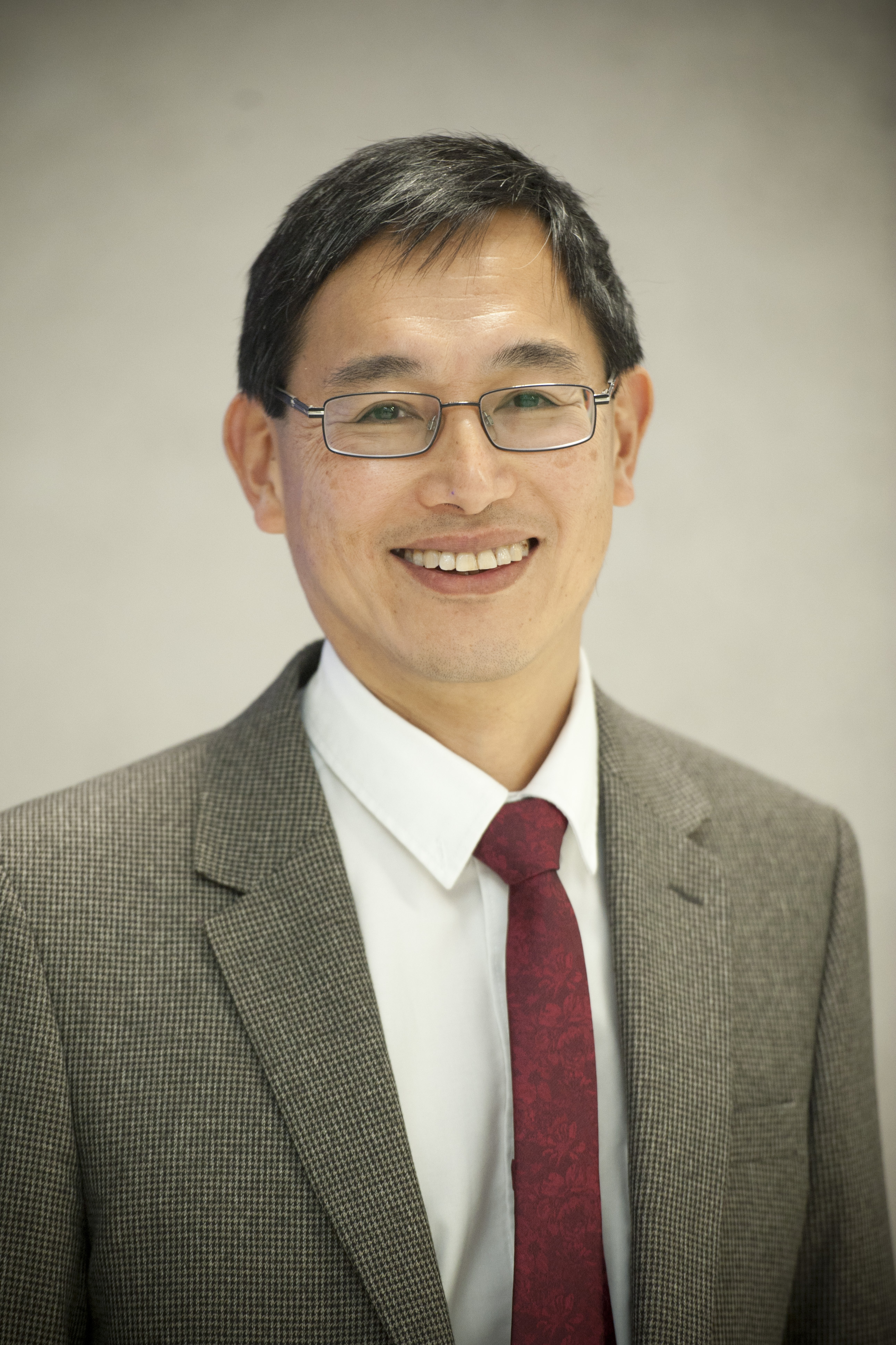 Professor Wei Shen Lim smiling to camera